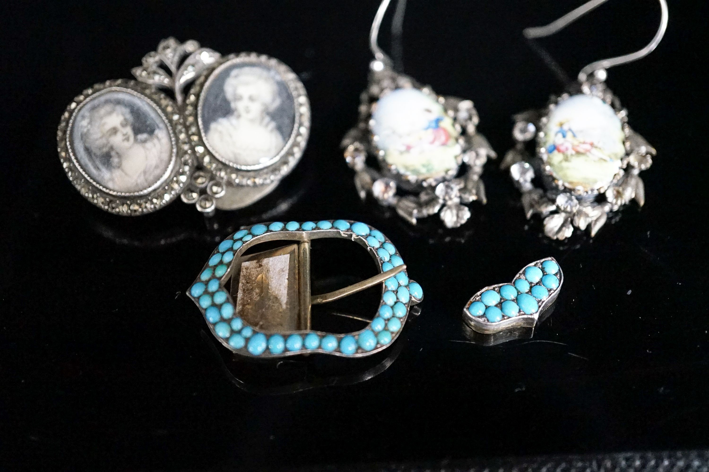 A pair of white metal, enamel and paste earrings, 34mm, a marcasite set double portrait brooch and a turquoise set buckle.